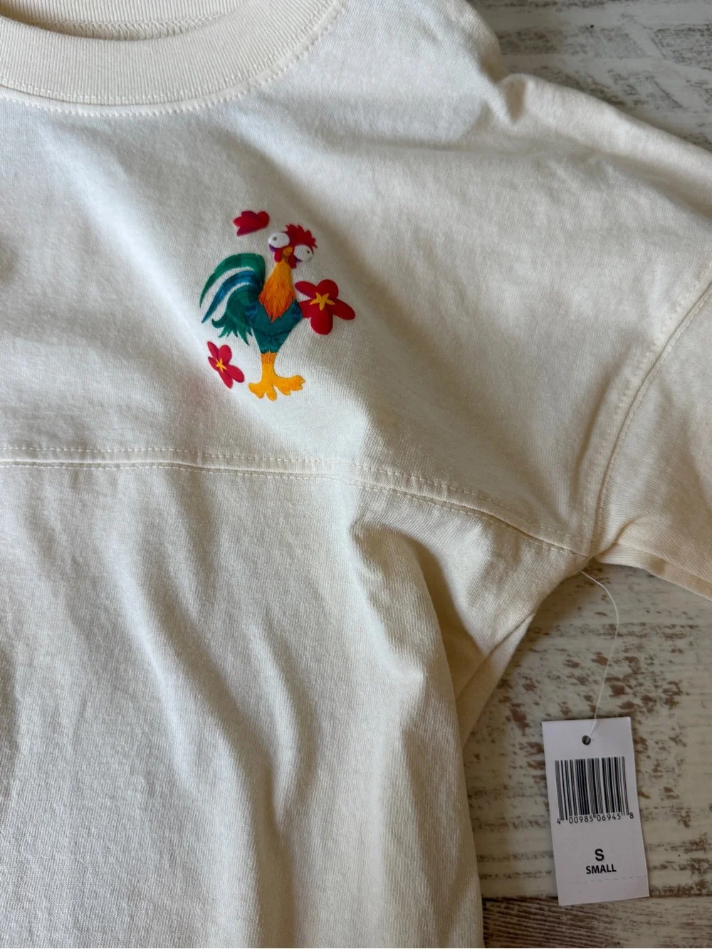 DISNEY Spirit Jersey MOANA 2 Wayfinder Top HeiHei Kids Sz S 2024 NWT
